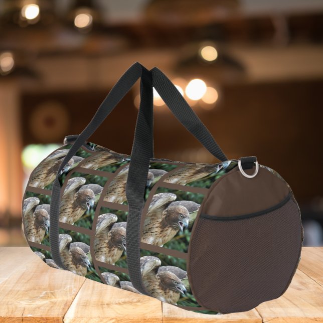 Red-tailed Hawk Pattern on Brown Duffle Bag (In Situ)