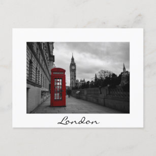 Red telephone box in London white text postcard