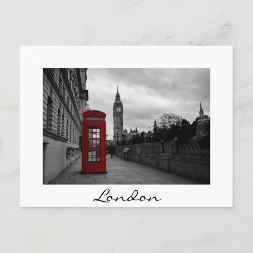 Red telephone box in London white text postcard