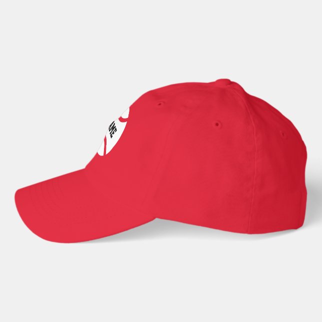 Red tennis cap against sun and sweat (Left)
