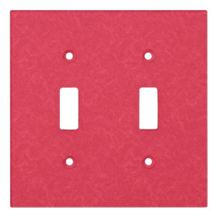 Red textured background with swirling pattern light switch cover