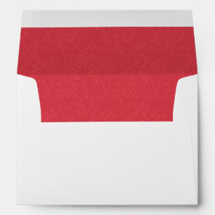 Red textured surface with subtle swirling pattern envelope