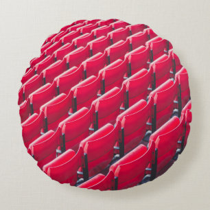Red theater chairs round pillow