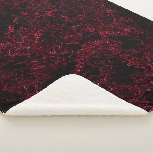 Red thick sponge upon dark red background sherpa blanket