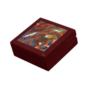 Red to colored stained texture under raw glass gift box