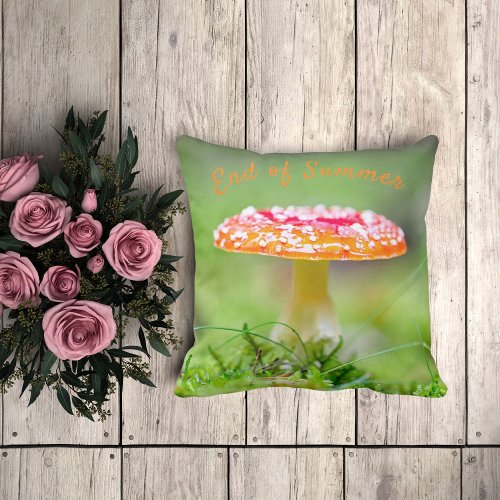 Red toadstool mushroom fall photo with green throw pillow
