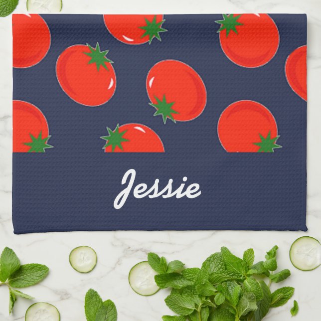 Red tomatoes on blue kitchen towel (Folded)