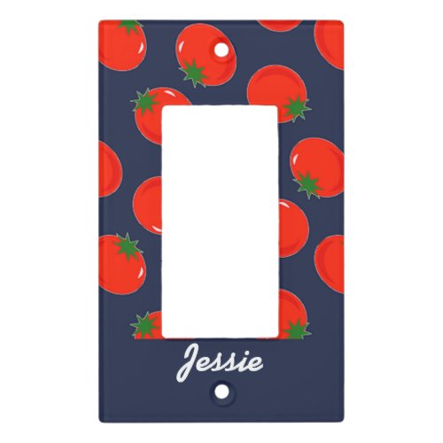 Red tomatoes on blue light switch cover