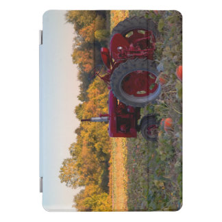 Red tractor in a field of pumpkins iPad pro cover