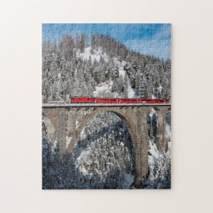 Red Train Pine Snow Covered Mountains Switzerland Jigsaw Puzzle