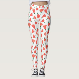 Red tulip bouquet scattered on creamy white leggings