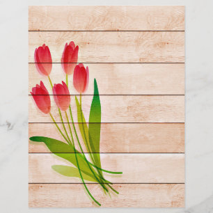 Red tulips on wood