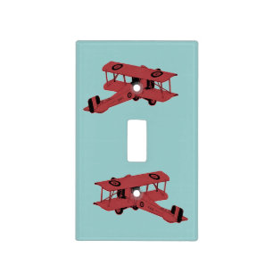 red vintage toy biplanes light switch cover
