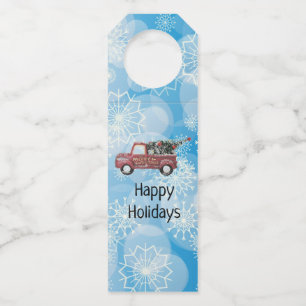 red vintage truck on a blue snowflake background   bottle hanger tag