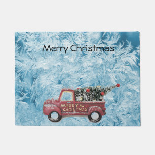 red vintage truck on a blue snowflake background doormat