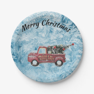 red vintage truck on a blue snowflake background paper plates