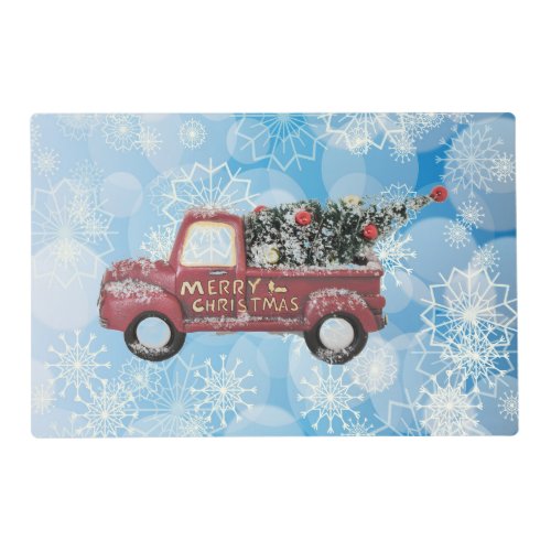 red vintage truck on a blue snowflake background   placemat