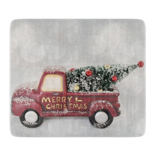 red vintage truck on a gray bokeh background  cutting board
