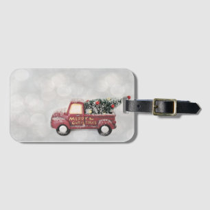 red vintage truck on a grey bokeh background luggage tag