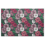 Red, white and bi-color roses with green leaves on fabric