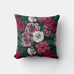Red, white and bi-color roses with green leaves on throw pillow