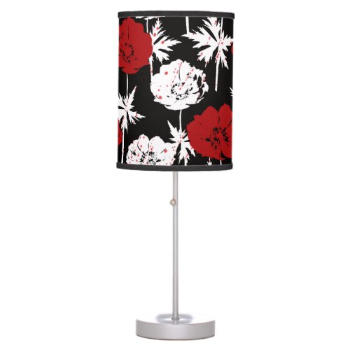 Red white flowers on black table lamp