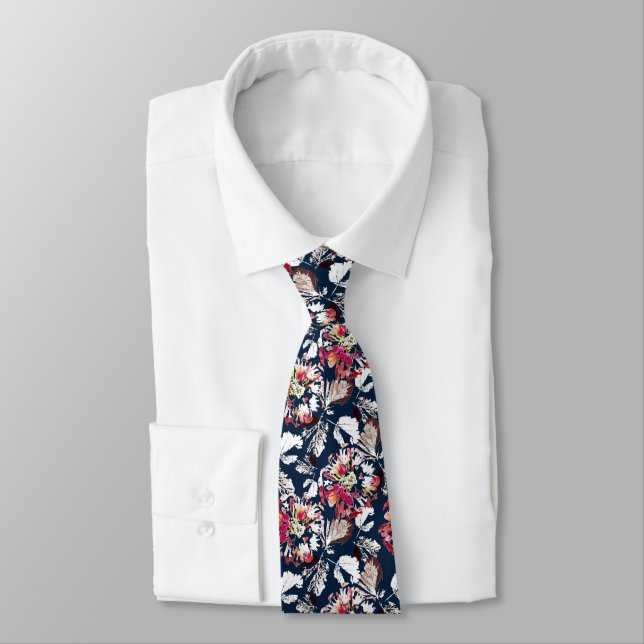 Red, white flowers on blue. neck tie (Tied)