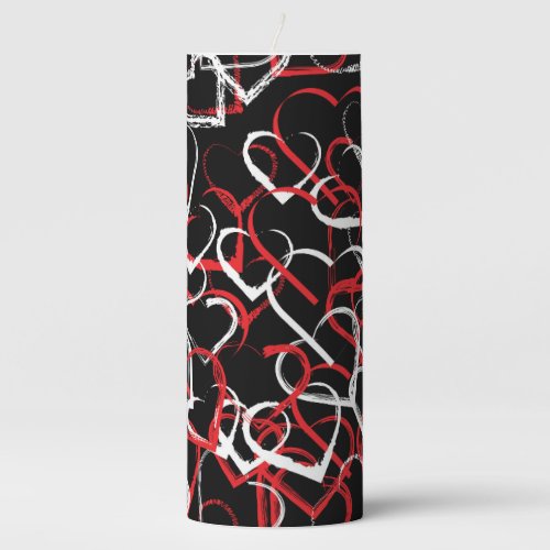 Red white heart pattern on black background pillar candle