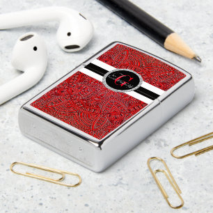 Red wicker abstract and black and a Monogram Zippo Lighter