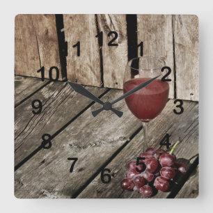 Red wine glass and grapes on wood texture square wall clock