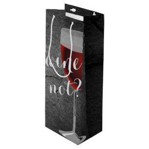red wine in glass on rock gift bag