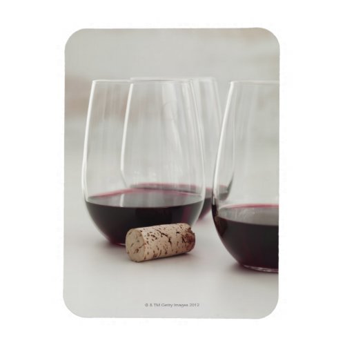 Red wine in stemless glasses magnet