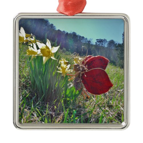 red wing fairy and daffodils metal ornament