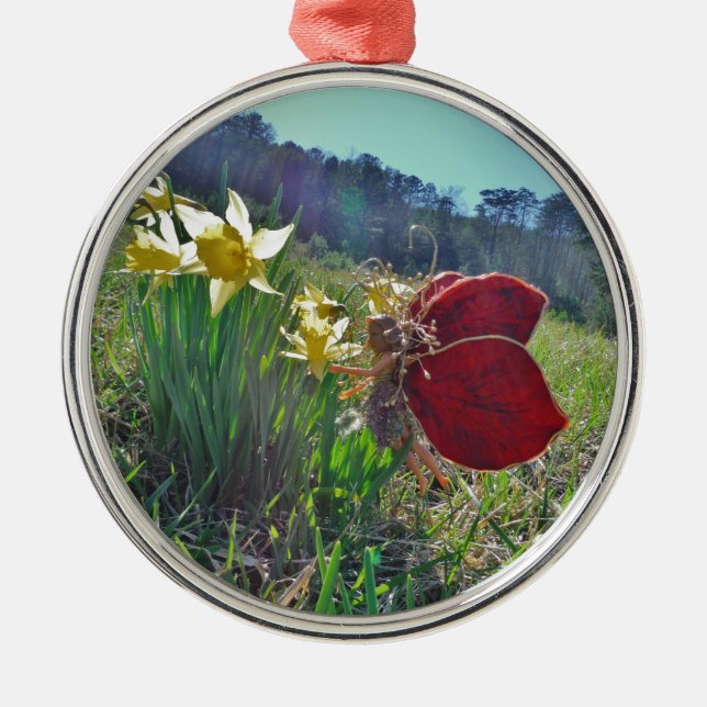 red wing fairy and daffodils metal ornament (Front)