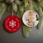 Red Winter Snowflake First Christmas Keepsake Ceramic Ornament<br><div class="desc">Ceramic holiday ornament personalized with your baby's photo and custom "My First Christmas" text. This simple modern holiday design features a white snowflake on a festive red background. Use the design tools to choose any background color, edit text fonts and colors and add your own photos to create your own...</div>