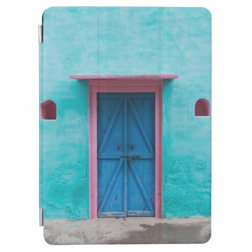 RED WOODEN DOOR ON BLUE CONCRETE WALL iPad AIR COVER