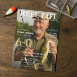 Reel Life Fishing Magazine 60th Birthday Party  Invitation<br><div class="desc">Celebrate a milestone birthday with this bold and playful fishing-themed invitation, styled like a vintage magazine cover. Featuring the headline “Reel Life: The Angler’s Edition, ” this design spotlights the guest of honor as the legendary fisherman reeling in the big 6-0. With fun headlines like “Gone fishin’ — for birthday...</div>
