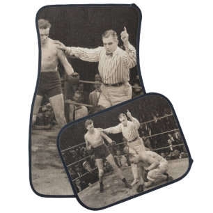 Referee counting over boxer in ringboxing, vintage car floor mat