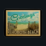 Rehoboth Beach Magnet Vintage Travel<br><div class="desc">This Greetings From Rehoboth Beach vintage postcard design features a sandy beach with a beautiful turquoise ocean water and above the sea,  a blue sky with billowy white clouds. In vintage travels style.</div>