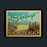 Rehoboth Beach Magnet Vintage Travel<br><div class="desc">This Greetings From Rehoboth Beach vintage postcard design features a sandy beach with a beautiful turquoise ocean water and above the sea,  a blue sky with billowy white clouds. In vintage travels style.</div>