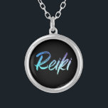 *~* Reiki Healer Jewelry With Intention (R)<br><div class="desc">*Round necklace with a black background with the word "Reiki" in a gradient iridescent neon design. The word "Reiki" is mostly turquoise with some gradient areas that are purple. * Reiki Masters, Reiki Practitioners and Reiki Students will not be the only ones drawn to this stunning necklace. This necklace would...</div>