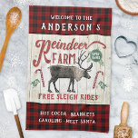 Reindeer Farm Rustic Vintage Farmhouse Custom Name Kitchen Towel<br><div class="desc">Decorate your home for Christmas with this personalized reindeer farm sign kitchen towel. This vintage-looking sign says, "Welcome to the (Your Name) Reindeer Farm / Family-Owned / Free Sleigh Rides / Hot Cocoa - Blankets - Caroling - Meet Santa." All text can be customized through the easy templates except "Reindeer...</div>