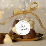 Relax Script Love is Sweet Wedding Favor Classic Round Sticker<br><div class="desc">Wedding favor sticker featuring the words "love is sweet" in a relax cursive script in black against a white background. Personalize it by replacing the placeholder text. For more options such as to change the font and it's size/color, expand /contract curve or the spacing between letters click the "Customize" button....</div>