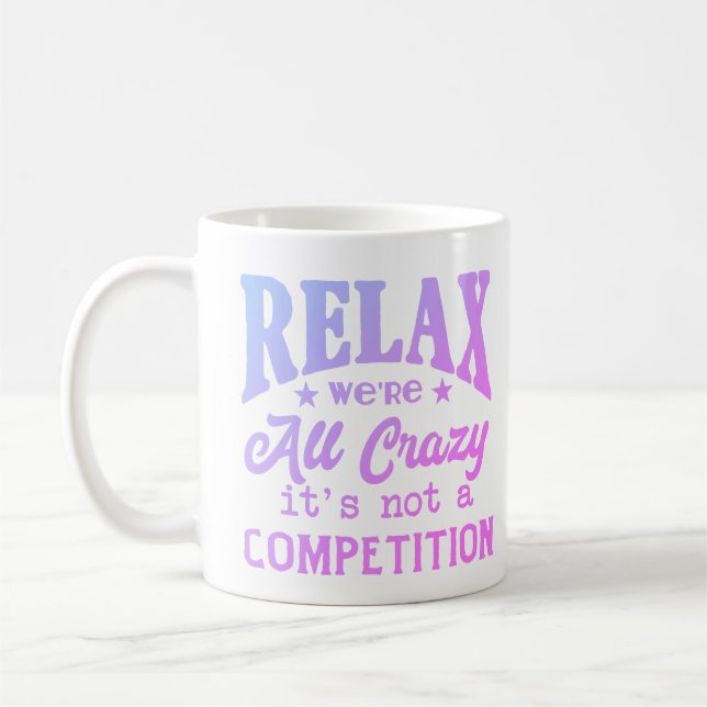 Relax we're all crazy not a competition coffee mug (Left)