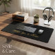 Solid black desk mat with Relax You're Home custom text