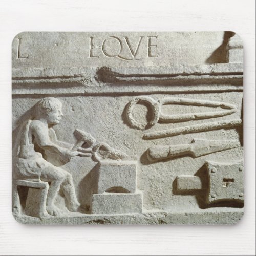 Relief depicting a blacksmiths shop and tools mouse pad