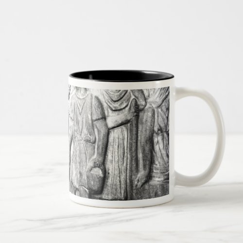 Relief depicting a boy reading to his teacher Two_Tone coffee mug
