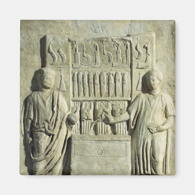 Relief depicting a cutlery shop magnet (Front)
