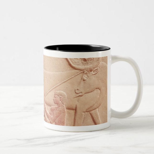 Relief depicting a man milking a cow Two-Tone coffee mug (Right)
