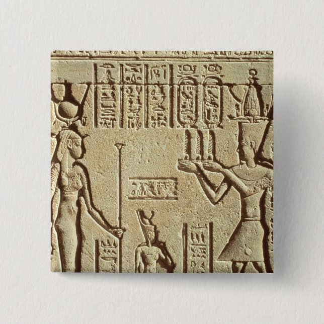 Relief depicting a pharaoh pinback button (Front)